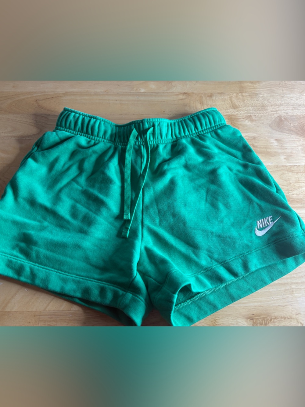 Nike women’s Kelly Green Athletic Shorts with White Swoosh